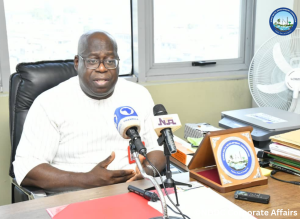 Dr George Uzonwanne speaking to journalists