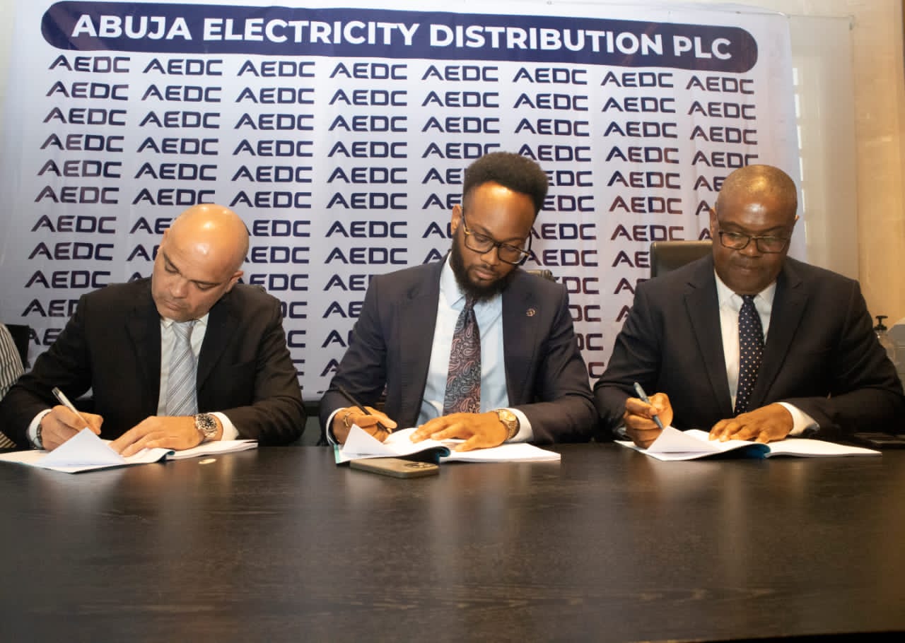 From Left: Mr. Hussein Akar, Managing Director The Wood Factory, Abuja; Mr. Victor T. Ezenwoko, Country Head Nigeria and Ghana, Daystar; Mr. Christopher Ezeafulukwe, MD/CEO Abuja Electricity Distribution Plc. at the signing of a tripartite agreement to deliver Uninterrupted Inter-Connected power solution for The Wood Factory in Abuja on Thursday