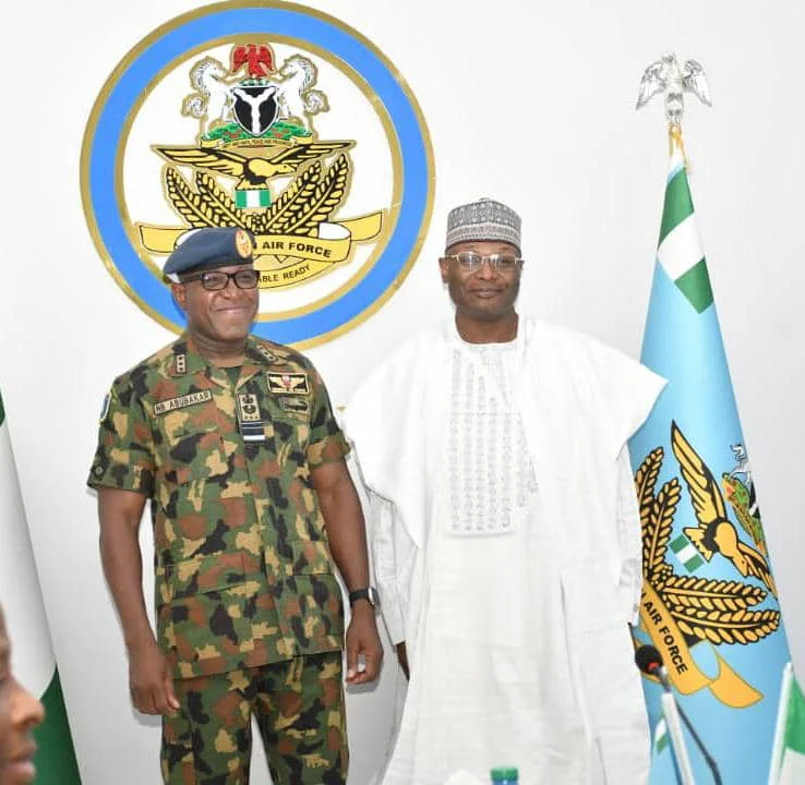 INEC Chairman, Mahmood Yakubu during a courtesy visit to the Chief of Air Staff, CAS Hassan Abubakar in Abuja