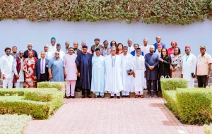 VP Kashim Shettima in a group photograph with the 37-man Tripartite Committee on National Minimum Wage, in Abuja