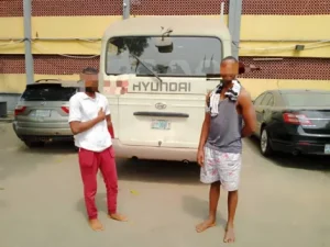 2 suspects, who allegedly drugged a school security guard and robbed the school.