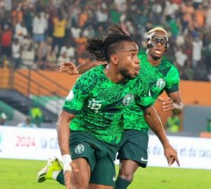 Super Eagles winger, Lookman celebrating his goal with Osimhen