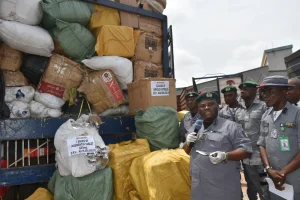 Oyo/Osun Customs Area Controller, Dr Ben Oramalugo showcasing seized fake pharmaceutical drugs to newsmen on Thursday in Ibadan.