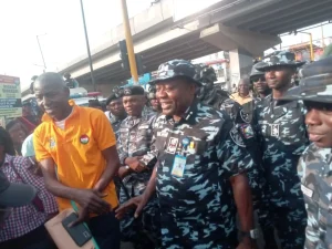 Lagos State Commissioner of Police, Mr Adegoke Fayoade, at the scene of the protest