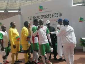 Players of the NNPC selected side receiving their medal after the novelty match with the ex Super Eagles stars e1708751134231