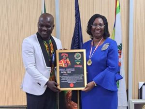 Mr. Dominic Mensah, President, of the organisation presenting the award to LASU VC, Prof. Ibiyemi Olatunji-Bello.