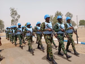 Nigerian Army troops forming up for a group photograph after the pre-deployment training graduation ceremony on Wednesday at MLAILPKC Jaji, Kaduna state