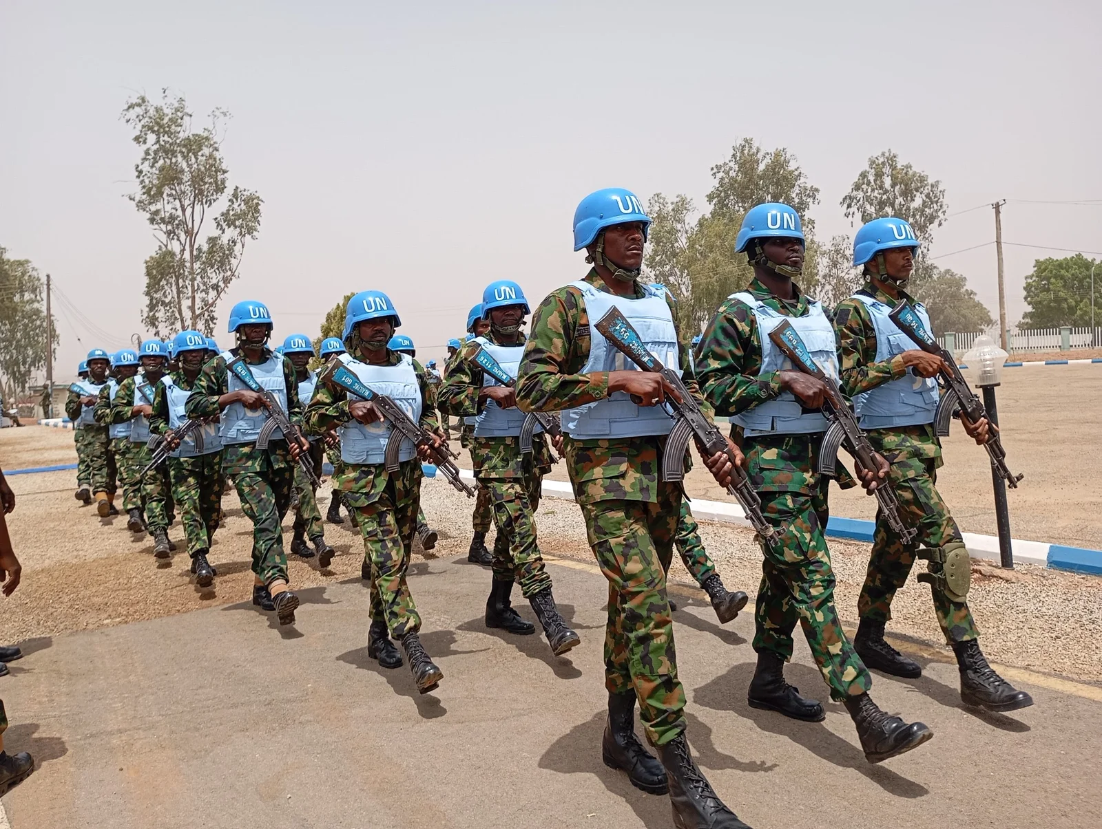 Nigerian Army troops forming up for a group photograph after the pre-deployment training graduation ceremony on Wednesday at MLAILPKC Jaji, Kaduna state