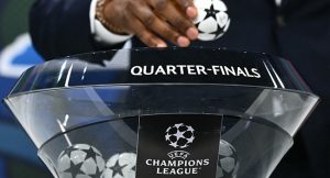 Former Nigerian footballer John Obi Mikel performs the 2023-2024 UEFA Champions League football tournament quarter-finals and semi-finals draw at the House of European Football in Nyon, on March 15, 2024. (Photo by Fabrice COFFRINI / AFP)