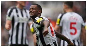 Newcastle United’s Swedish striker #14 Alexander Isak celebrates after scoring their third goal during the English Premier League football match between Newcastle United and Tottenham Hotspur at St James’ Park in Newcastle-upon-Tyne, north east England on April 13, 2024. (Photo by Andy Buchanan / AFP)