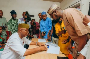 Gov. Lucky Aiyedatiwa revalidating his APC membership in Igbokoda, Ilaje Local Government Area of Ondo State on Monday.