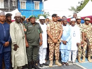 Commander Operation SAFE HAVEN (OPSH), Major General AE Abubakar, in a group photograph with others during the 2024 Eid-Al -Fitr luncheon organized for men and officers of the Command