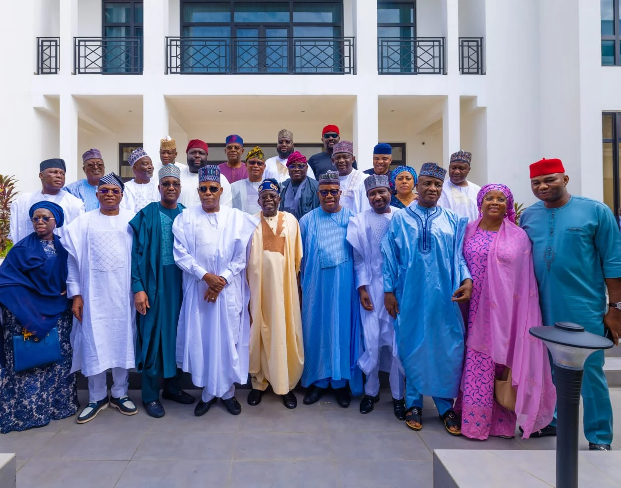 President in a group photograph with VP Kashim Shettima, state governors and the leadership of the National Assembly in Lagos on Friday.