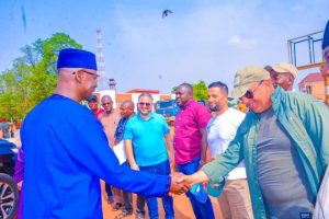 Gov Sule, of Nasarawa State, exchanging pleasantries with contractor and others, during the commencement of work last week Thursday.