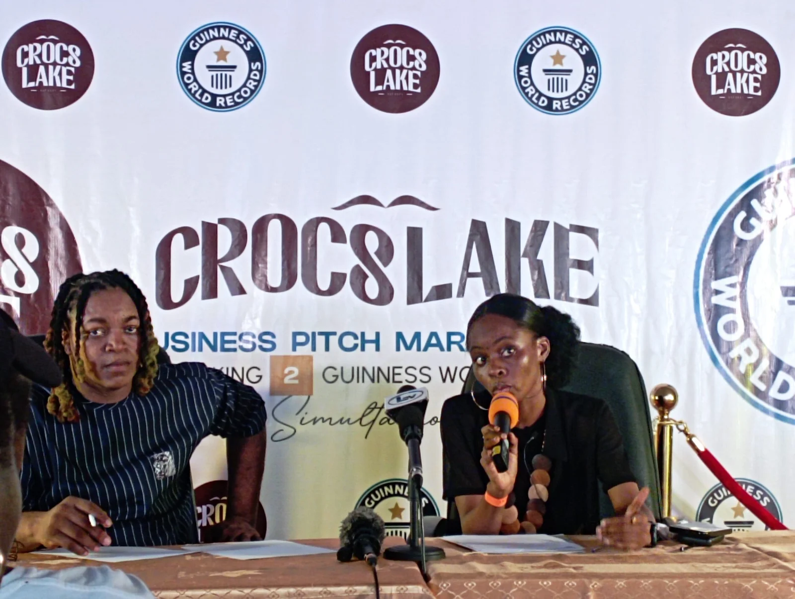 Mr Mayodele David, Initiator, Crocslake Business Pitch Marathon, and Ms Grace Anuforo, Team Member, Crocslake during a news conference on Sunday evening in Lagos.