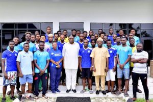 Cross River State Governor, Bassey Otu I'm a group photograph with the management and players of Rovers FC of Calaba