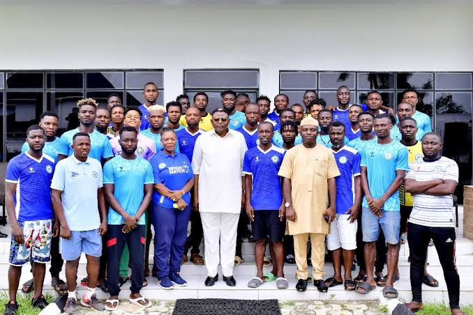 Cross River State Governor, Bassey Otu I'm a group photograph with the management and players of Rovers FC of Calaba