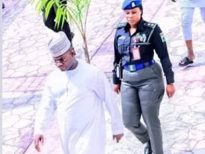 Former Kogi State Governor, Yahaya Bello and his female aide-de-camp