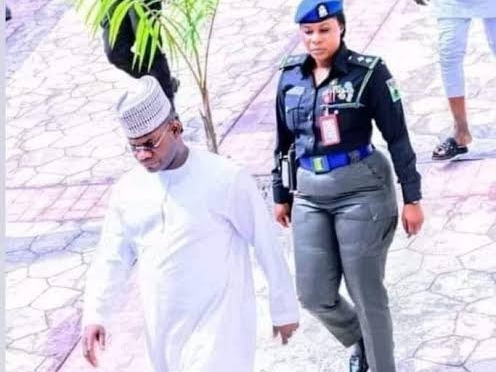 Former Kogi State Governor, Yahaya Bello and his female aide-de-camp