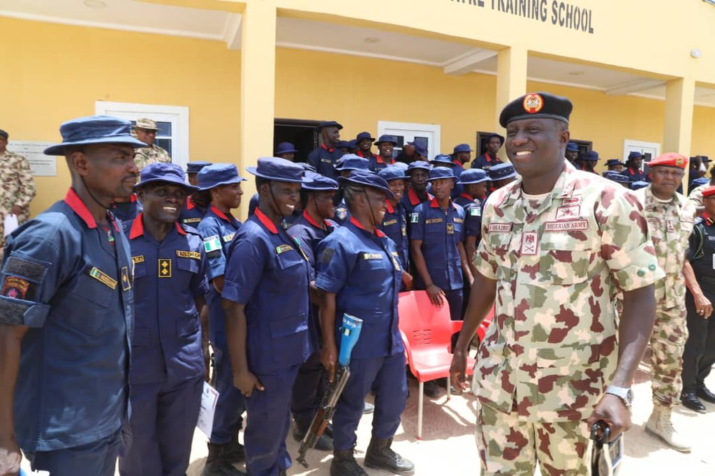 Theatre Commander Major General Waidi Shaibu and some of the graduating NSCDC personnel,