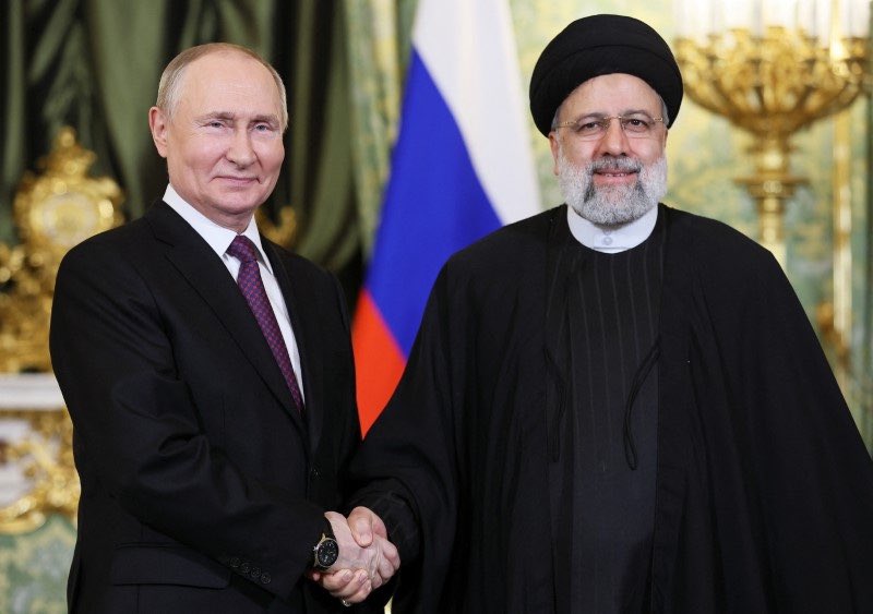 Russian President Vladimir Putin and late Iranian President, Ebrahim Raisi