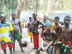 Some illegal miners at one of the mining sites in the Cross River National Park, Ifumkpa