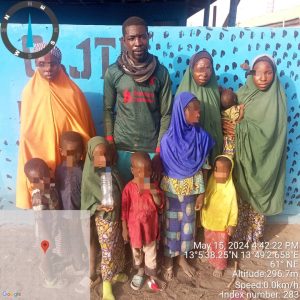 A surrendered Boko Haram fighter and his family members