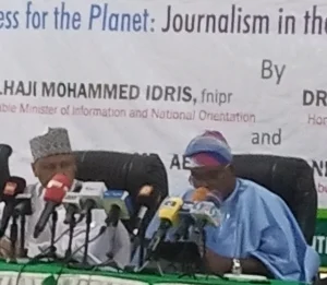Minister of Information and National Orientation, Alhaji Mohammed Idris 1st Left) and the Minister of State for Environment, Dr Iziaq Salako during the press briefing in Abuja on Friday