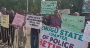Retired police officers protesting over unpaid pensions at the National Assembly on Tuesday