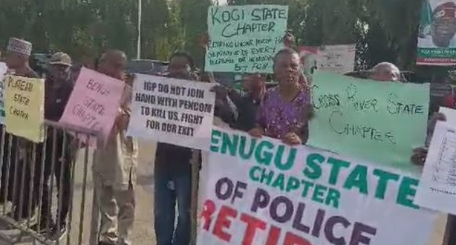 Retired police officers protesting over unpaid pensions at the National Assembly on Tuesday