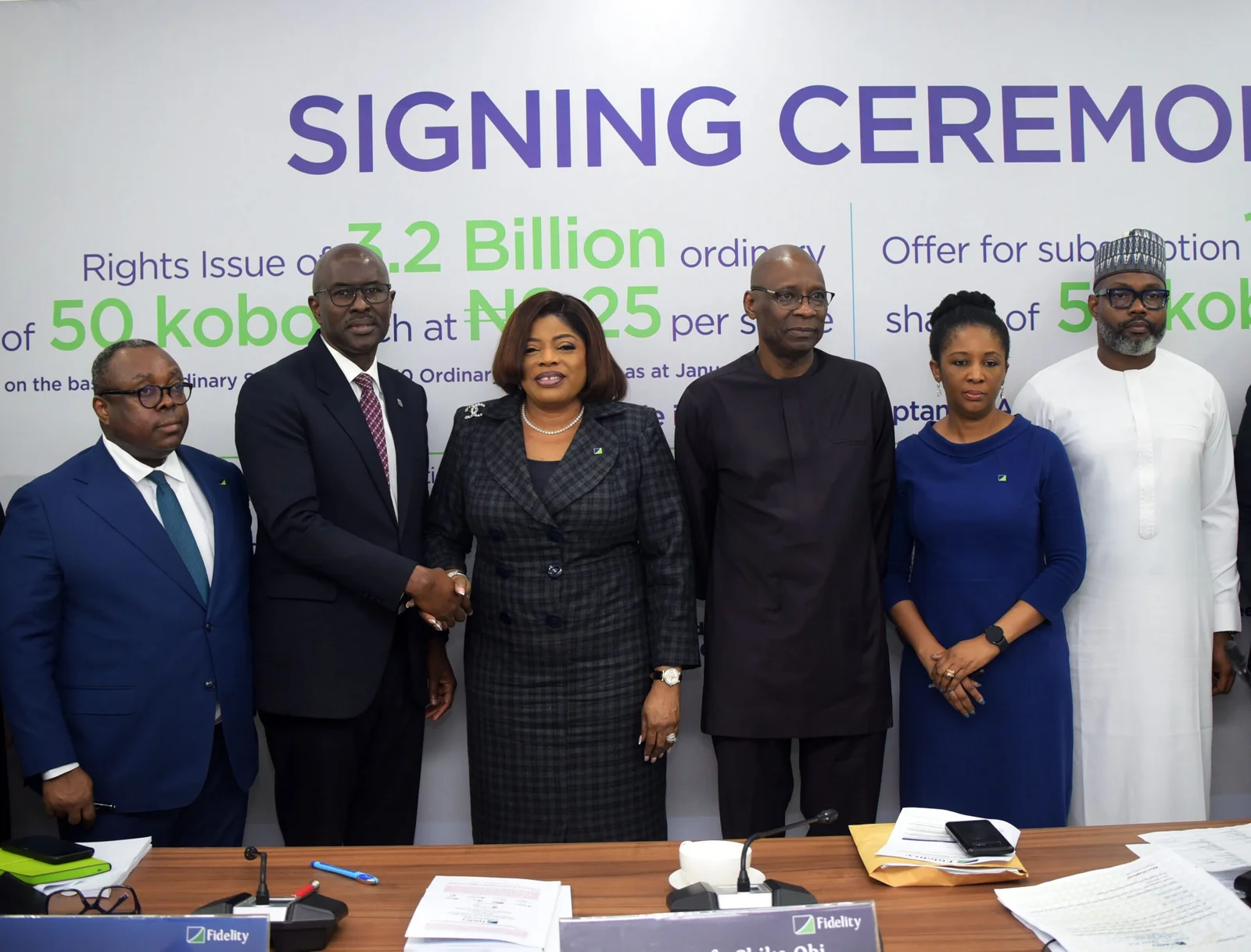 L-R: Mr Stanley Amuchie, Executive Director, Chief Operations and Information Officer, Fidelity Bank Plc, Mr Oladele Sotubo, MD/CEO Stanbic Capital, Dr Nneka Onyeali-Ikpe, MD/CEO, Fidelity Bank Plc, Mr Mustafa Chike-Obi Chairman, Fidelity Bank Plc, Ms Ezinwa Unuigboje, Company Secretary, Fidelity Bank Plc, and Jubril Enakele, Chief Executive, Iron Global Markets Ltd., at the signing of the Fidelity Bank Public Offer and Rights Issue in Lagos