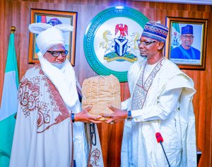 Governor Sule, presents a basket of kolanuts to the Emir of Keffi, who led the delegation of traditional rulers to Government House, Lafia