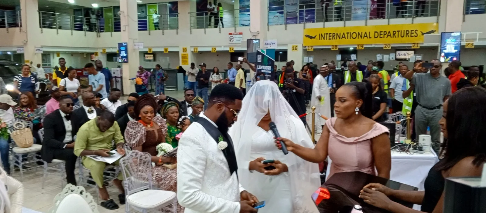Couple take wedding vows at Lagos airport terminal II 2 IMG 20240629 160530 690 scaled 1