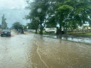 A road in Oko filling situated around LASU-Isheri road flooded with water.