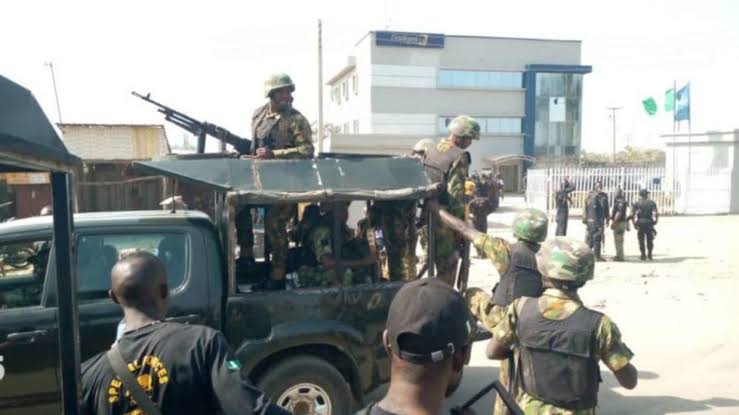 Security operatives at the scene of the bank robbery