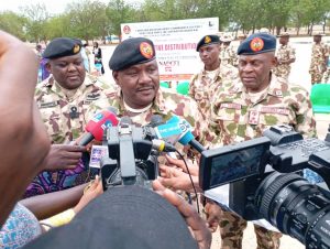 GOC 7 Div NA Maiduguri, Brig. Gen. AGL Haruna speaking to journalists at the palliatives distribution to widows of fallen heroes 