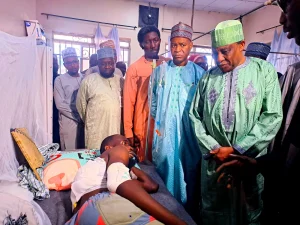 The Managing Director of NEDC and his team sympathising with victim of Gwoza suicide bombing receiving treatment at Maiduguri Specialist hospital on Tuesday.