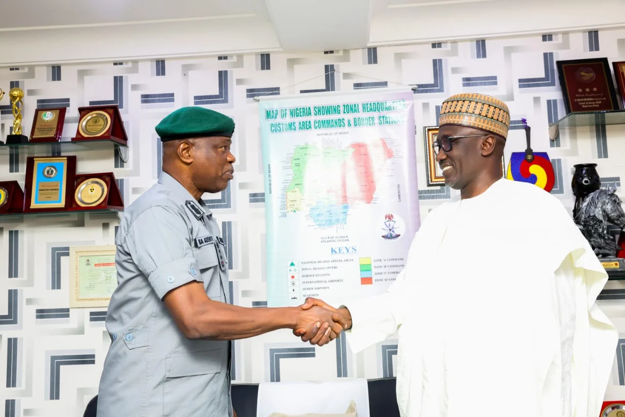 The Comptroller-General of Customs, Adewale Adeniyi, discussing with Group CEO of NNPCL, Mele Kyari, during their meeting at Customs Headquarters in Abuja