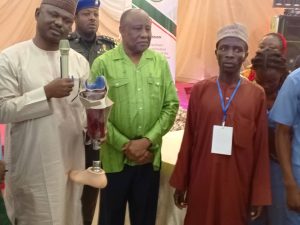 The Executive Secretary, National Commission for Persons with Disabilities, Mr. James Lalu, and the NEDC's Managing Director/CEO, Ambassador Goni Mohammed Alkali, during the symbolic distribution and presentation of assistive devices to persons with disabilities in Borno State.