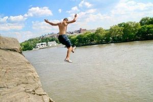 Man jumps into river