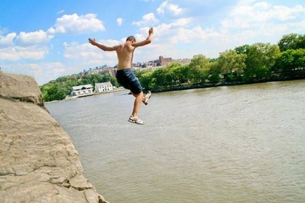 Man jumps into river