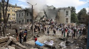 Rescuers work at Kyiv's Okhmatdyt hospital, which was damaged in a Russian missile strike on Monday morning. Gleb Garanich/Reuters
