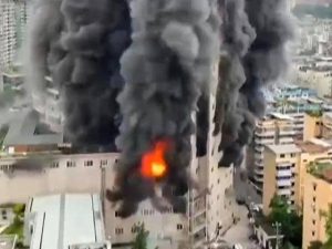 At least 16 dead in building fire in China