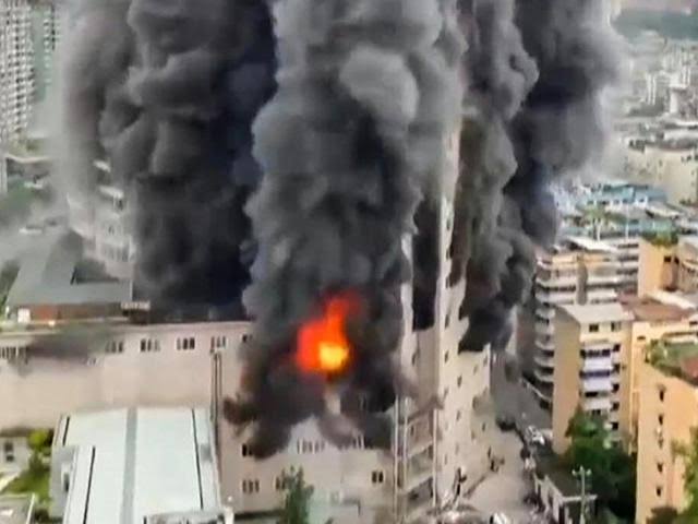 At least 16 dead in building fire in China