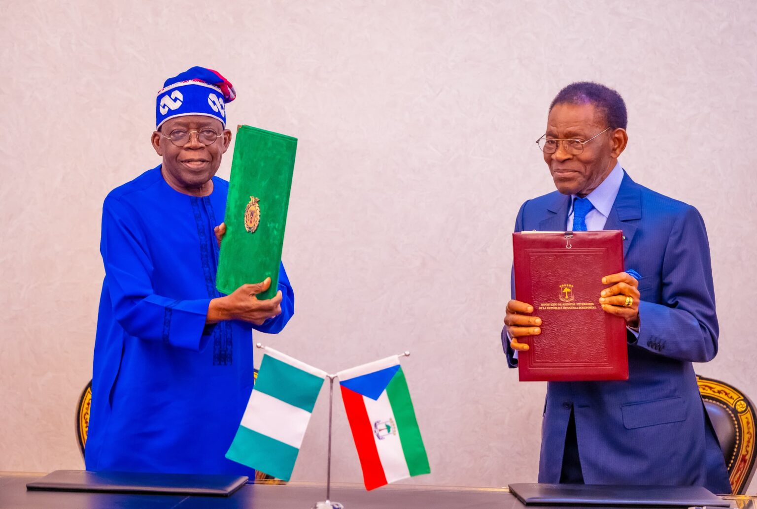 President Bola Tinubu and Equatorial Guinea President, Teodoro Mbasogo, displaying agreement on Gulf of Guinea Pipeline Project signed on Wednesday in Malabo