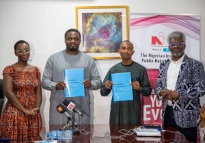 L-R: Client Service Specialist, Drawbridge Communication Management Company, Jessica Ahmodu, CEO, Drawbridge Communication, Hassan Abdul, Chairman NIPR-FCT, Stanley Ogadigo and Chairman Projects and Partnerships C'tee of NIPR-FCT, Dr. Omoniyi Ibietan at the signing ceremony in Abuja