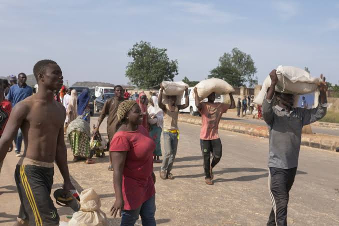 Protesters loot rice