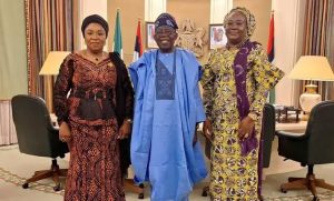 President Bola Tinubu in a group photograph with Mrs Folashade Esan, outgoing Head of Service of the Federation, and her successor, Mrs Esther Wilson-Jack.
