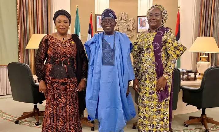 President Bola Tinubu in a group photograph with Mrs Folashade Esan, outgoing Head of Service of the Federation, and her successor, Mrs Esther Wilson-Jack.