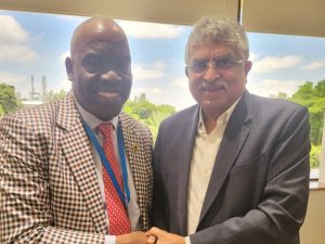 Chief Executive of the NUPRC, Engr Gbenga Komolafe, and Mr. Nandan Nilekani, the Chairman of Infosys.